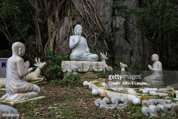 Buddha under the Bodhi Tree with Deer and Dharma Wheel - The Marble Mountains are made up of five hills made of marble and limestone near Danang...
