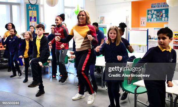 Super Movers ambassadors Alex Scott and Gabby Logan take part in a classroom session during the Premier League and BBC Super Movers launch event at...