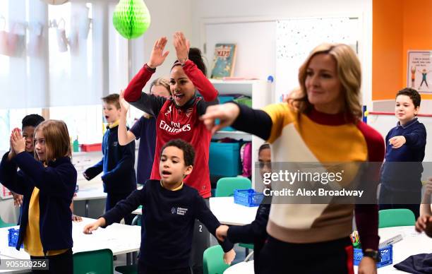 Super Movers ambassadors Alex Scott and Gabby Logan take part in a classroom session during the Premier League and BBC Super Movers launch event at...