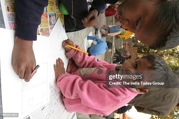 Children being taught at the the Priya cinema complex- Vasant Vihar, New Delhi by volunteers Perna Dubey, Akshay Sharma, Nirvaan Ghosh, Kaushik...