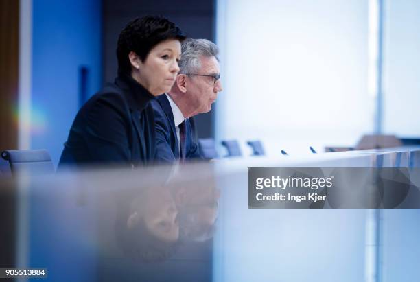 German Interior Minister Thomas de Maiziere and Jutta Cordt, head of Federal Agency of Migration and Refugees, join the federal press conference, on...