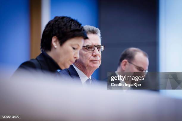 German Interior Minister Thomas de Maiziere and Jutta Cordt, head of Federal Agency of Migration and Refugees, join the federal press conference, on...