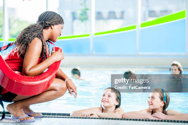 talking to the lifeguard - the lifeguard stock pictures, royalty-free photos & images