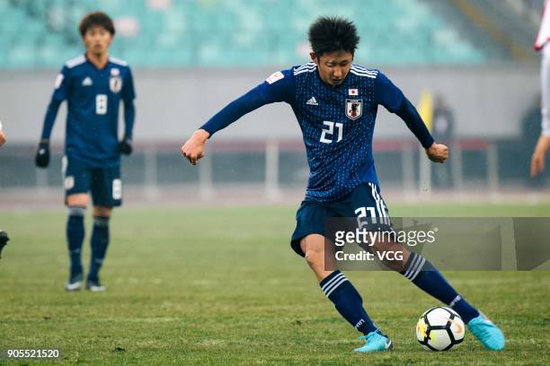 Hiroki Ito of Japan drives the ball during the AFC U-23 Championship Group B match between Japan and North Korea at Jiangyin Stadium on January 16,...