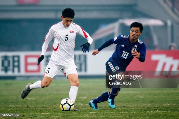 Ri Un-Chol of North Korea controls the ball during the AFC U-23 Championship Group B match between Japan and North Korea at Jiangyin Stadium on...