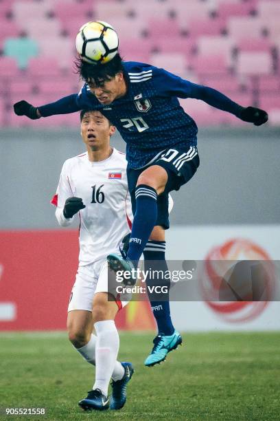 Taiyo Koga of Japan heads the ball during the AFC U-23 Championship Group B match between Japan and North Korea at Jiangyin Stadium on January 16,...