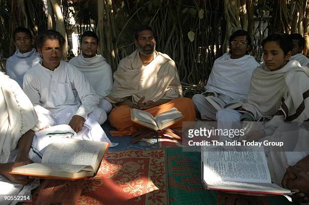 Acharya with students at Arsh Gurukul in Mahendragarh, Haryana, India