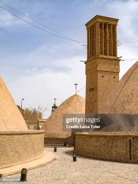 Wind towers used to keep the town municipal water cool in Naein, Iran. Wind towers, or windcatchers, are a traditional Persian architectural element...