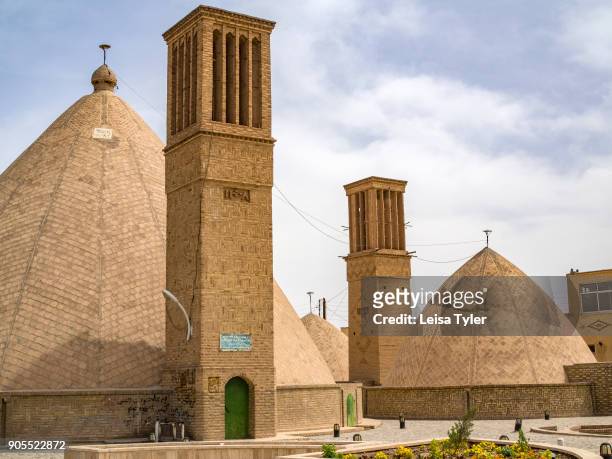 Wind towers used to keep the town municipal water cool in Naein, Iran. Wind towers, or windcatchers, are a traditional Persian architectural element...