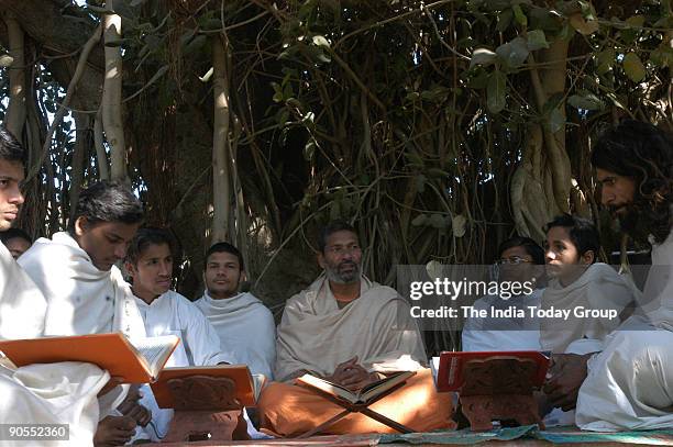 Acharya with students at Arsh Gurukul in Mahendragarh, Haryana, India