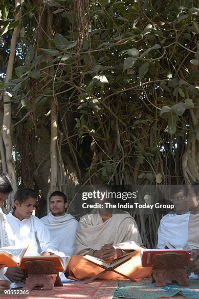 Acharya with students at Arsh Gurukul in Mahendragarh, Haryana, India