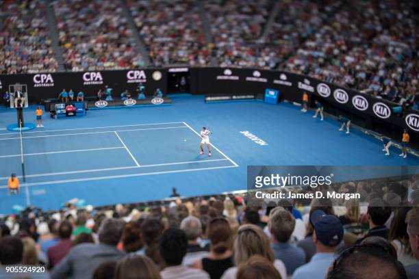 The crowd on Rod Laver Arena watch Roger Federer of Switzerland play Aljaz Bedene of Slovenia on day two of the 2018 Australian Open at Melbourne...
