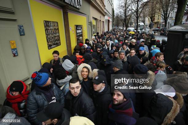 Sneaker enthusiasts wait in line to purchase the very limited edition adidas EQT Support 93/Berlin shoe outside the Overkill sneaker store on January...