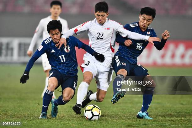 Kim Kuk-Bom of North Korea controls the ball during the AFC U-23 Championship Group B match between Japan and North Korea at Jiangyin Stadium on...