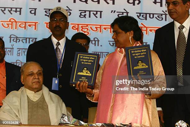 Mayawati, Vice-President of Bahujan Samaj Party and and former UP Chief Minister with Kanshi Ram, Bahujan Samaj Party founder, celebrating her 50th...