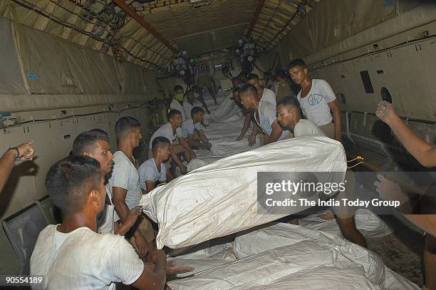 Relief Material meant for earthquake affected areas in Kashmir being loaded into an IL 76 aircraft at Palam Air Force Base.