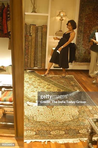 Angela Poupon checking out the carpets at Khazana, a 25 year old boutique, renovation party at hotel Taj Manshing, New Delhi.