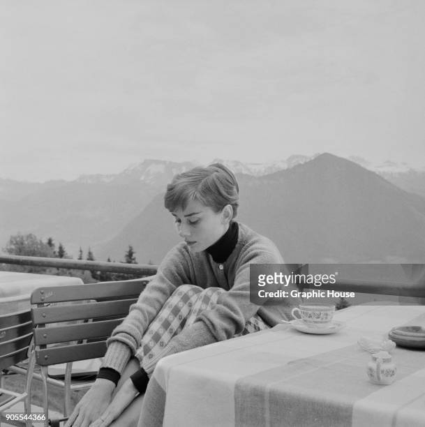 Belgian-born actress Audrey Hepburn on the terrace of the Restaurant Hammetschwand at the summit of the Bürgenstock, Switzerland, circa 1955.