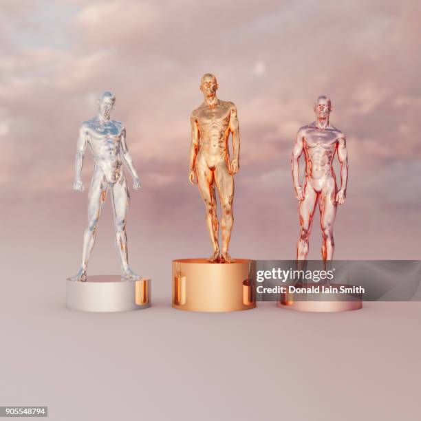 gold, silver and bronze men on pedestals - bronze alloy stock-fotos und bilder