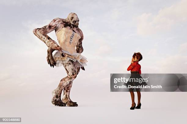 girl examining alien wearing dress - zombie girl ストックフォトと画像