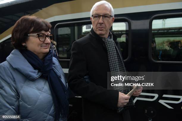 Candidate for the presidential election Jiri Drahos and his wife Eva arrive at the Prague main train station for the start of the election campaign...