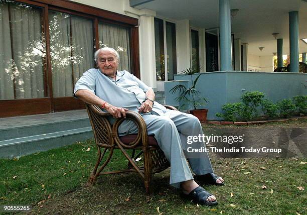 Arvind Lalbhai, Chairman, Arvind Mills, poses outside residence, in Ahmedabad, India. Profile, Sitting