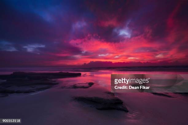 colorful sunrise on florida's emerald coast - palm coast, fla stock pictures, royalty-free photos & images