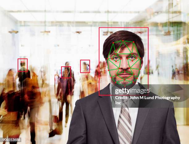 facial recognition of caucasian businessman - facial recognition technology stock-fotos und bilder