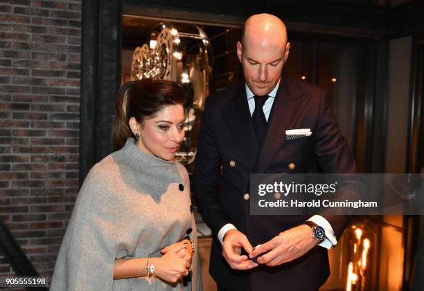 Kanika Kapoor visits the IWC booth during the Maison's launch of its Jubilee Collection at the Salon International de la Haute Horlogerie on January...