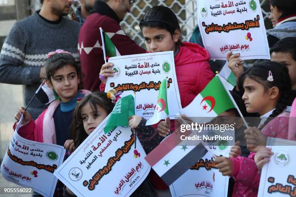 Palestinian children take part in a protest in Arab Children 's Day in Gaza city, on 16 Jan 2018