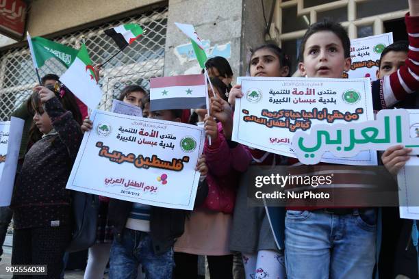 Palestinian children take part in a protest in Arab Children 's Day in Gaza city, on 16 Jan 2018