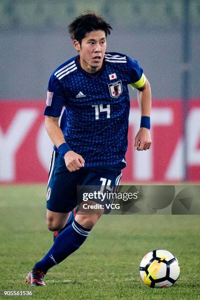 Akito Takagi of Japan drives the ball during the AFC U-23 Championship Group B match between Japan and North Korea at Jiangyin Stadium on January 16,...