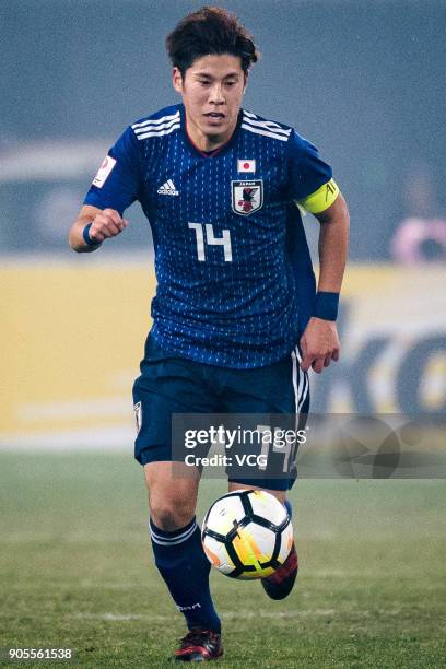 Akito Takagi of Japan drives the ball during the AFC U-23 Championship Group B match between Japan and North Korea at Jiangyin Stadium on January 16,...