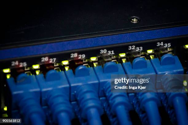 Connectors and LED lights of a server in a data room, on January 12, 2018 in Berlin, Germany.