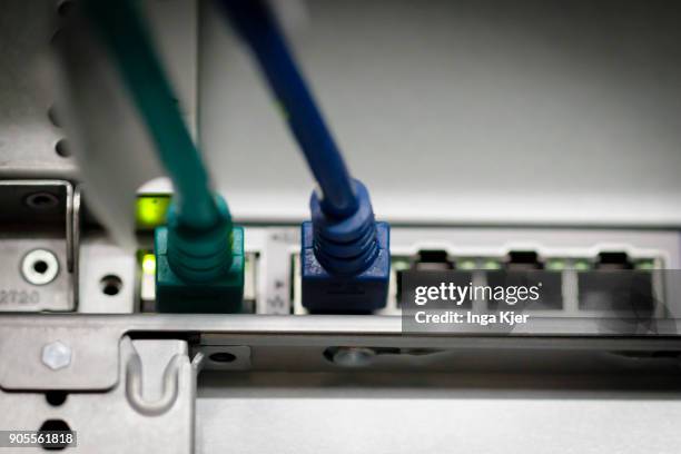 Connectors and LED lights of a server in a data room, on January 12, 2018 in Berlin, Germany.