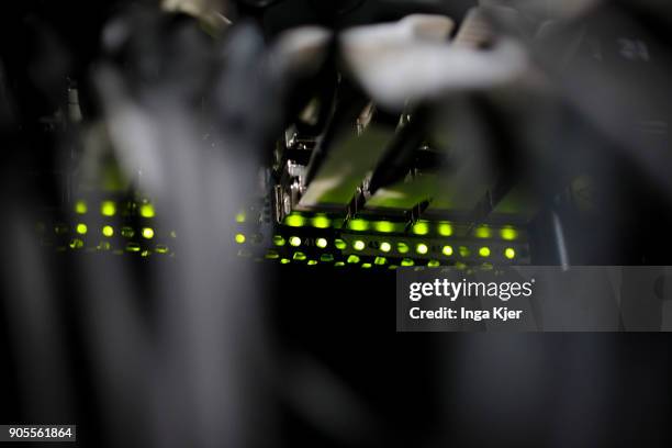 Connectors and LED lights of a server in a data room, on January 12, 2018 in Berlin, Germany.