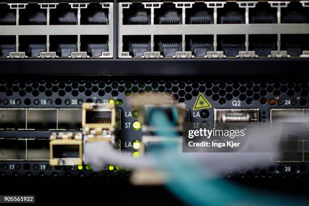 Connectors and LED lights of a server in a data room, on January 12, 2018 in Berlin, Germany.