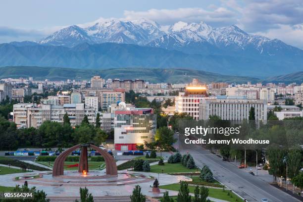 scenic view of cityscape and mountains - bichkek photos et images de collection