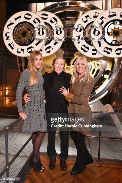 Alana Netzer, Guenter Netzer and Elvira Netzer visit the IWC booth during the Maison's launch of its Jubilee Collection at the Salon International de...