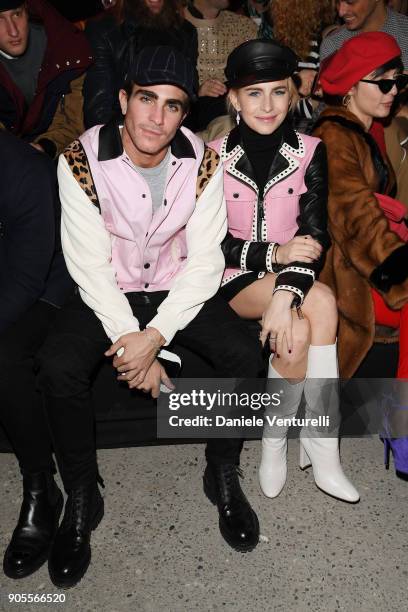 Caroline Daur and Carlo Sestini attend the Dsquared2 show during Milan Menswear Fashion Week Fall/Winter 2018/19 on January 14, 2018 in Milan, Italy.