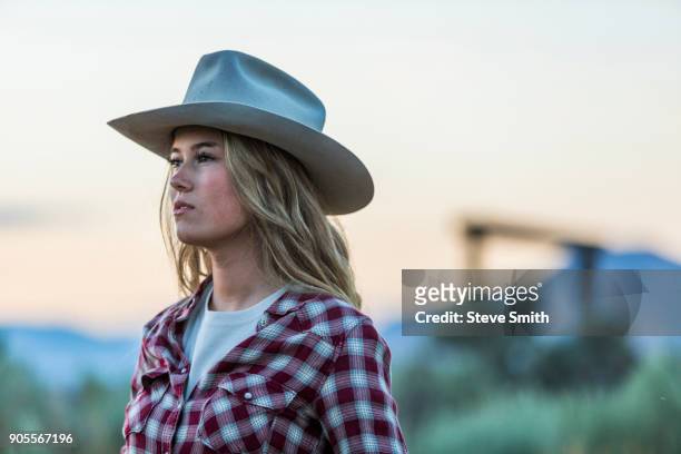 caucasian teenage girl wearing cowboy hat - ranch icon stock pictures, royalty-free photos & images