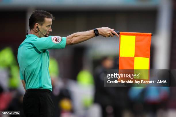 Linesman holds up a flag during the Sky Bet Championship match between Barnsley and Wolverhampton at Oakwell Stadium on January 13, 2018 in Barnsley,...