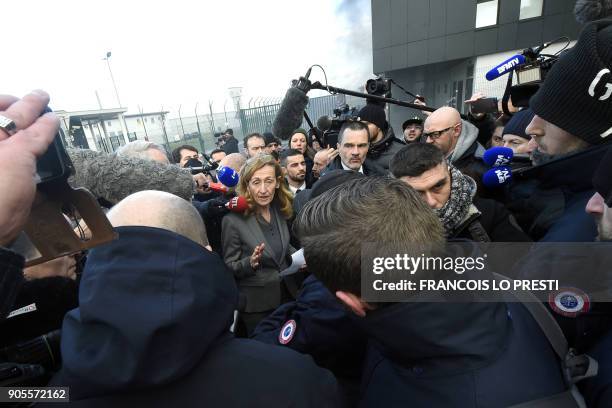 French Justice Minister Nicole Belloubet speaks to journalists as she leaves the Vendin-le-Vieil prison after her visit on January 16 as French...