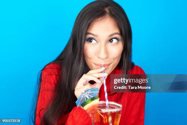 woman drinking cocktail - caught in the act stock pictures, royalty-free photos & images