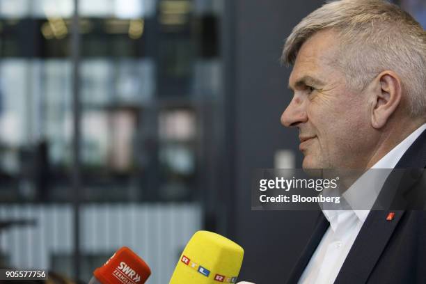Joerg Hofmann, chairman of IG Metall, faces journalists during the labor union's annual news conference in Frankfurt, Germany, on Tuesday, Jan. 16,...