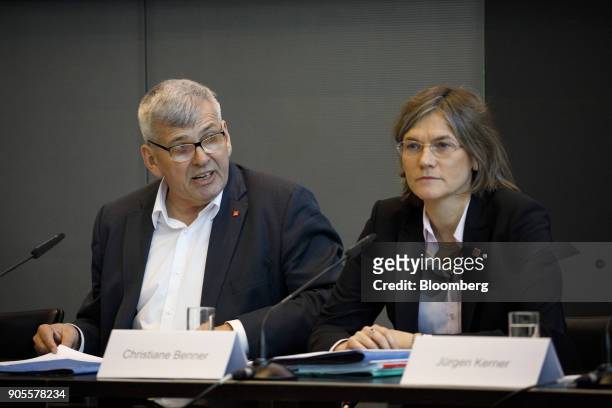 Joerg Hofmann, chairman of IG Metall, left, speaks as he sits beside Christiane Benner, vice president of of IG Metall, during the labor union's...