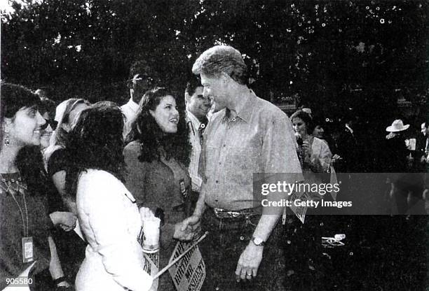 Photograph showing former White House intern Monica Lewinsky meeting President Bill Clinton at a White House function submitted as evidence in...