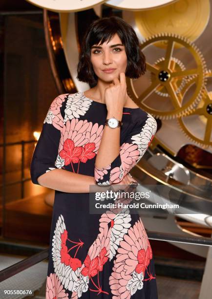 Tuba Buyukustun visits the IWC booth during the Maison's launch of its Jubilee Collection at the Salon International de la Haute Horlogerie on...