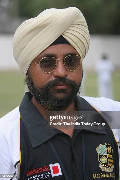 Gurpreet Singh Harry, coach of Delhi's indoor cricket team during a practice session at MM Public School at Pitampura.