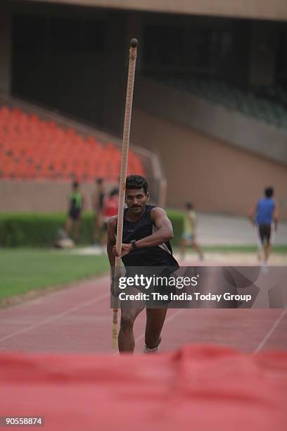 Geesh Kumar, National Pole Vault champion during a practice session at Jawahar Lal Nehru Stadium, New Delhi.